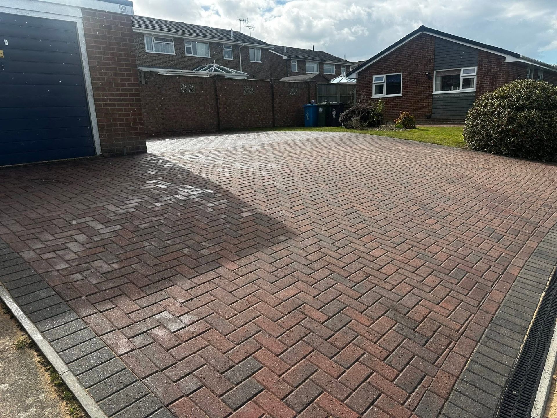 Restored block paving driveway after professional pressure washing in Dorset