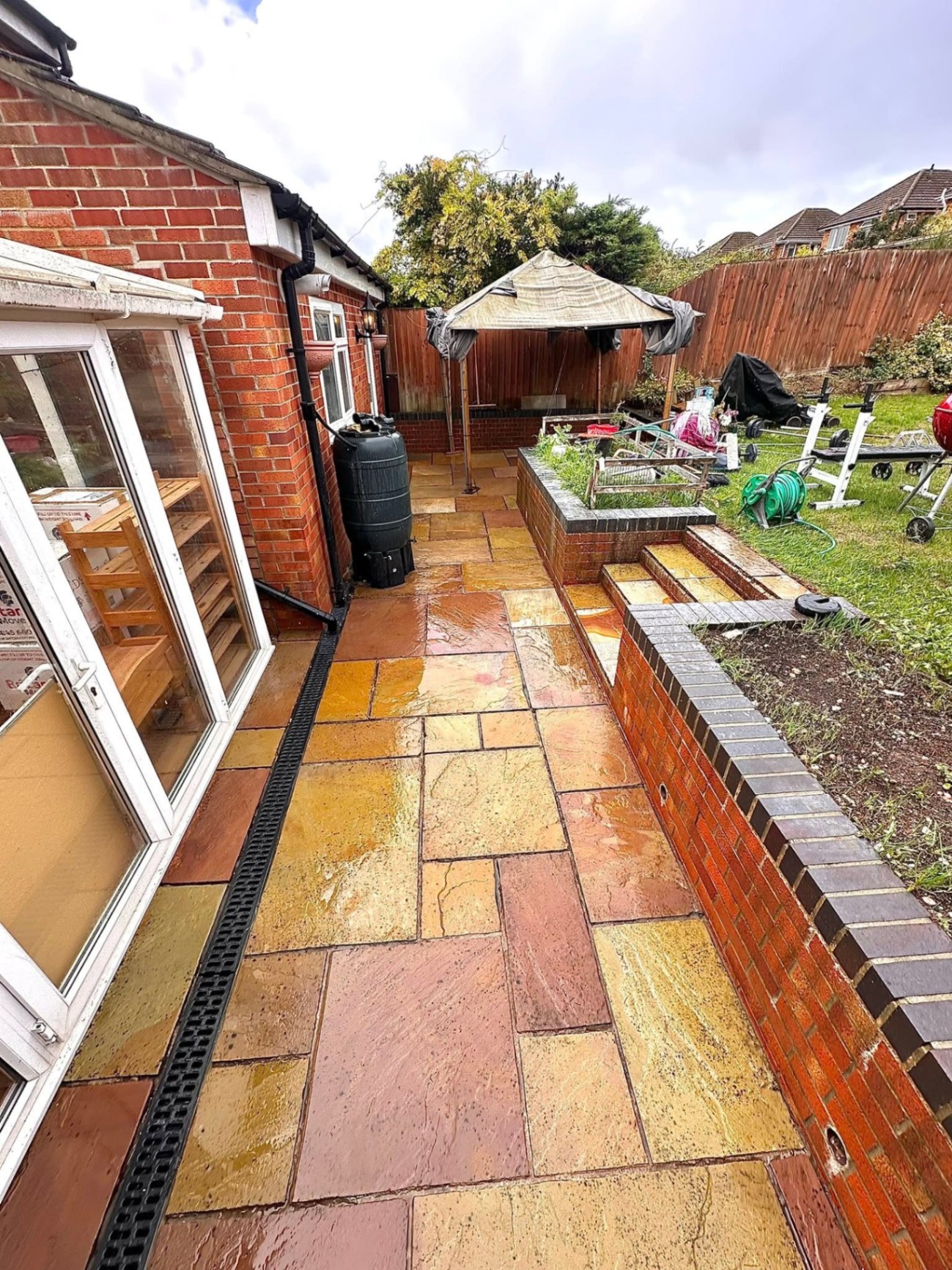 Indian sandstone patio after professional cleaning, Dorset
